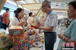 从西湖到天山 一场土特产推介背后的“浙疆情”